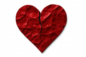 Red crumpled paper heart is broken in two pieces, representing a broken relationship, over a transparent background
