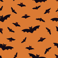 Halloween bat seamless pattern on the orange background.