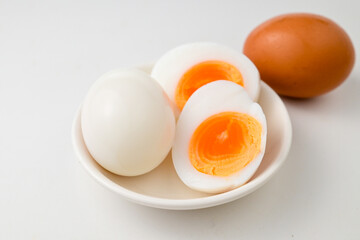 Medium-boiled egg,Boiled egg in white plate on white background