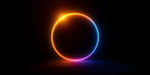 Obraz premium Neon light effect circle on a black background, glowing ring frame in orange and blue colors, glowing lines. Abstract round shape with a gradient, 