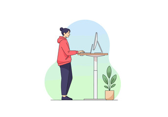 A woman working at a standing desk in a modern office. She's focused and engaged with her work, with a plant nearby