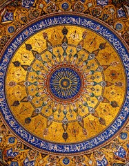 Ornate, golden dome ceiling with intricate patterns