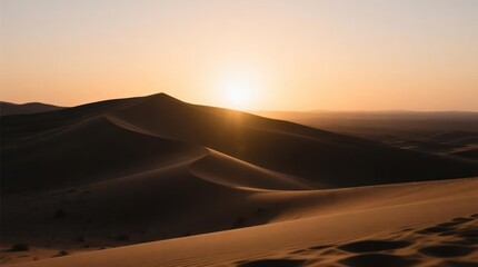 Golden desert sunset. Sunbeams illuminate sand dunes