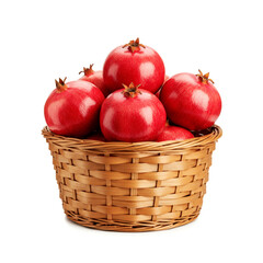 Ripe pomegranates in a wicker basket isolated on white background