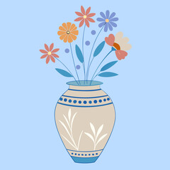 Ceramic vase filled with colorful flowers on a light blue background