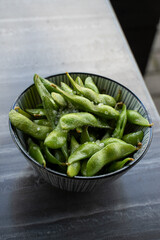 Hot Green edamame beans with salt.