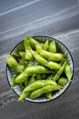 appetizers green edamame on the table.