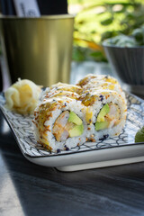 sushi with shrimp tempura inside. 