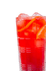 Refreshing red drink with ice and citrus slices for summer enjoyment