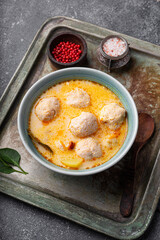 Soup with meatballs, potatoes and cheese. Meatballs in thick vegetable soup Albondigas. Mexican and Spanish, European and Russian cuisine. Close up