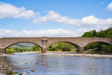 The river Dee and the river Dee bridge in Ballater in Scotland	