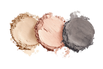 Three circular eyeshadows in neutral tones