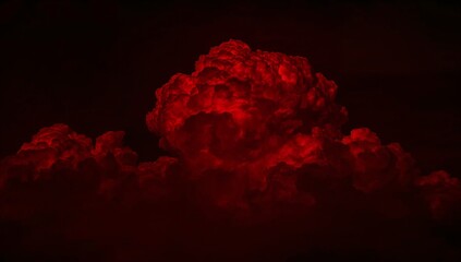 Dramatic and ominous red storm cloud glowing intensely against a dark, apocalyptic night sky