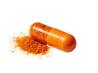 Orange capsule spilling orange powder