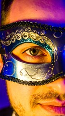 Close-up of masked person's eye