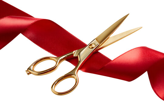 Golden scissors cutting a red ribbon, symbolizing a grand opening or celebration.