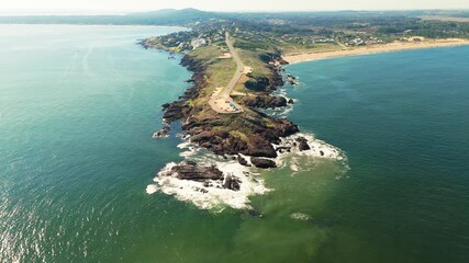 Ascending aerial footage of Punta Ballena Park on the Atlantic Ocean coast in Maldonado, Uruguay - Powered by Adobe