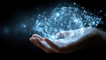 Hand holding a glowing, interconnected sphere