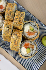 Sushi rolls close up top view