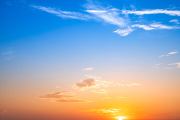Beautiful , luxury soft gradient orange gold clouds and sunlight on the blue sky perfect for the background, take in evening,Twilight, Large size, high definition landscape photo