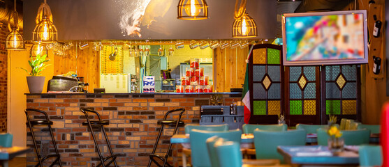 Natural restaurant interior with scenic view at sunset