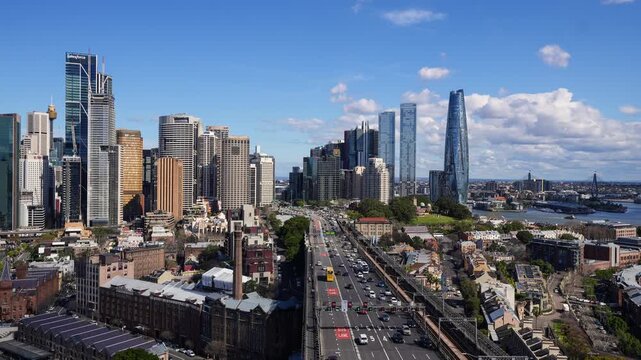 Sydney, Australia: Time lapse of the traffic on the Cahill expressway on the Sydney harbor bridge with skyline in the background in Australia largest city. 