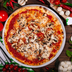 Pizza funghi with tomato sauce, mozzarella and fresh mushrooms