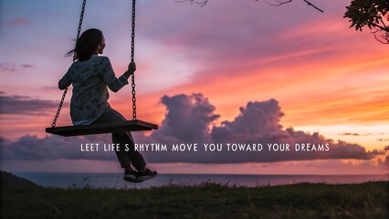 Woman on a swing enjoying the beautiful sunset over the ocean.