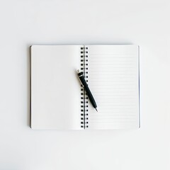 Open spiral notebook with blank pages and pen for writing notes and journaling
