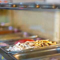 Restaurant kitchen. Champignions ready for pizza HoReCa sphere.