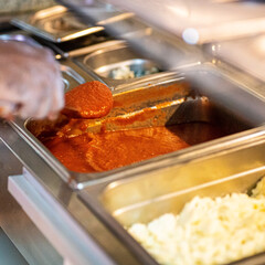 Classic homemade tomato sauce with basil for pasta and pizza horeca kitchen