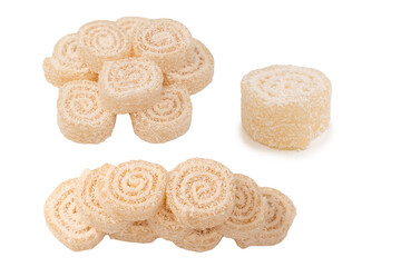 Coconut candy roll isolated on a white background.