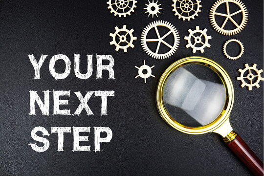 Your Next Step text message with magnifying glass on black background