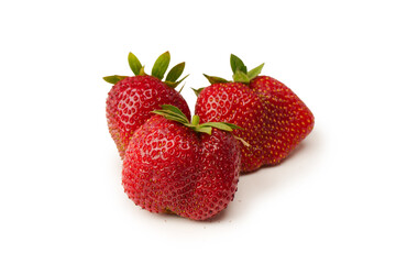 Fresh group of berries isolated on a white background.