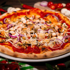 Pizza frutti di mare seafood, mozzarella mussels octopus squid, salmon, shrimp