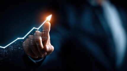 A hand interacts with a glowing, spark-filled data chart, symbolizing the power of data visualization and analytics in understanding trends and driving business decisions.