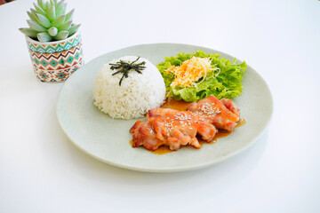 Indonesian Chicken in Red Sauce Served with Steamed Rice and Vegetables