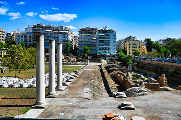 Ancient Roman forum in Thessaloniki with ruins and Modern Urban Backdrop