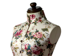 Vintage floral mannequin with adjustable wooden neck and fabric details, side angle view, isolated on a transparent background, PNG