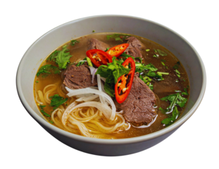 Delicious vietnamese pho bo beef noodle soup with fresh herbs and chili in a bowl isolated on transparent background