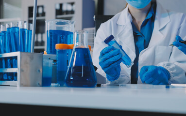 Fototapeta premium Collaboration, tablet or science with people in lab together for research or development. Innovation, tech and microscope with scientist team in clinical trial for planning or medical investigation