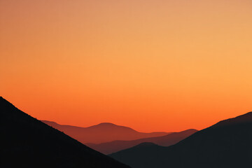 Fototapeta premium Gradient of sunset orange background fading into copy space, warm glowing evening tones wallpaper, elegant abstract gradient design, smooth orange sunset backdrop illustration, stylish minimal templat