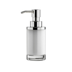 Obraz premium Sleek hand soap dispenser with reflective accents against a minimalist presentation, ideal for