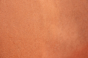 Soft coral fabric shaggy close-up as background