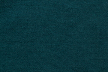 Dark turquoise fine knit fabric that can be used as a background, pattern, texture or wallpaper