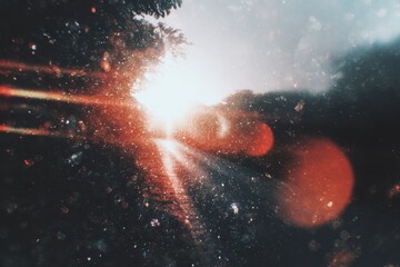 light leak overlay effect with bokeh blur light leaks, retro grain noisy film distressed texture light leak flare on black background, retro film overlay