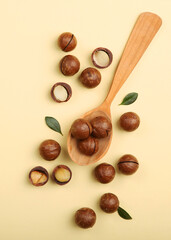 macadamia nuts on the table on a light background close-up. Vertical photo format 