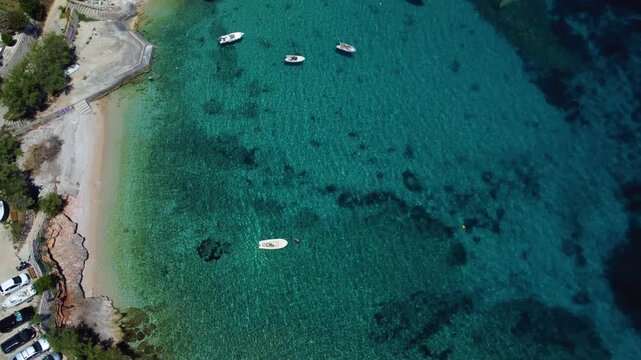 Zavala beach taken with my drone, showing the beautiful blue water and little fishing boats.