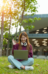  Study of portraits and female students at a university park to learn or study, scholarship books and laptops.