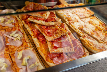 Italian pizza in in glass window display